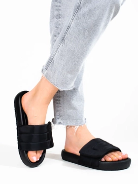 Black adjustable strap slides