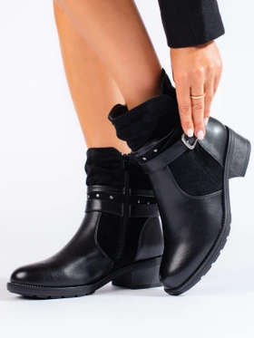 Women's ankle boots with a decorative strap