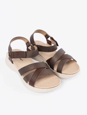 Brown platform sandals with white sole
