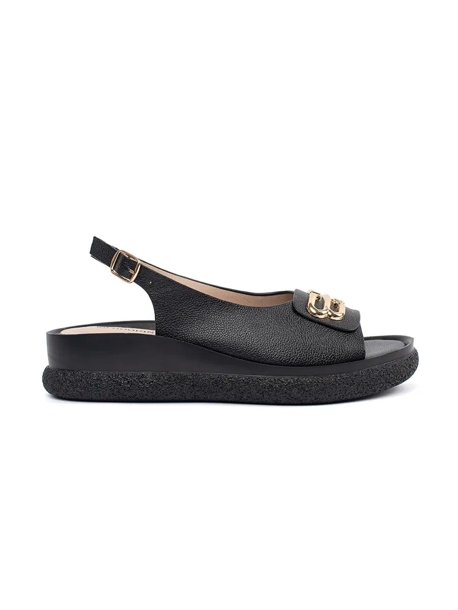 Black flat sandals with embellishment