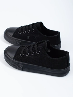 Black slip-on sneakers for kids