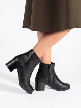 Chic Black Heeled Ankle Boots by Sergio Leone