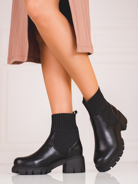 Black ankle boots with a flexible shaft