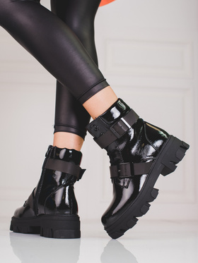 Boots with black buckles