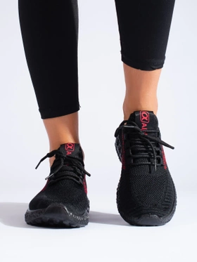 Women's black sports shoes with black soles