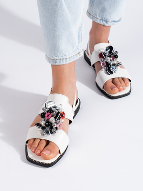 White sandals with decorative detail