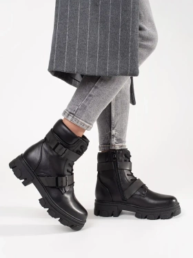 Boots with black buckles