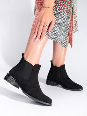 Black ankle boots with decorative heel by Sergio Leone