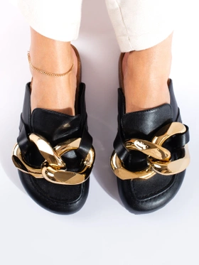 Black Slip-Ons with Bold Chain Detail